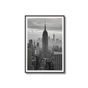 Framed black and white cityscape print featuring the Empire State Building.